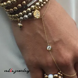 Gold Balls and Charm Bracelets V0317