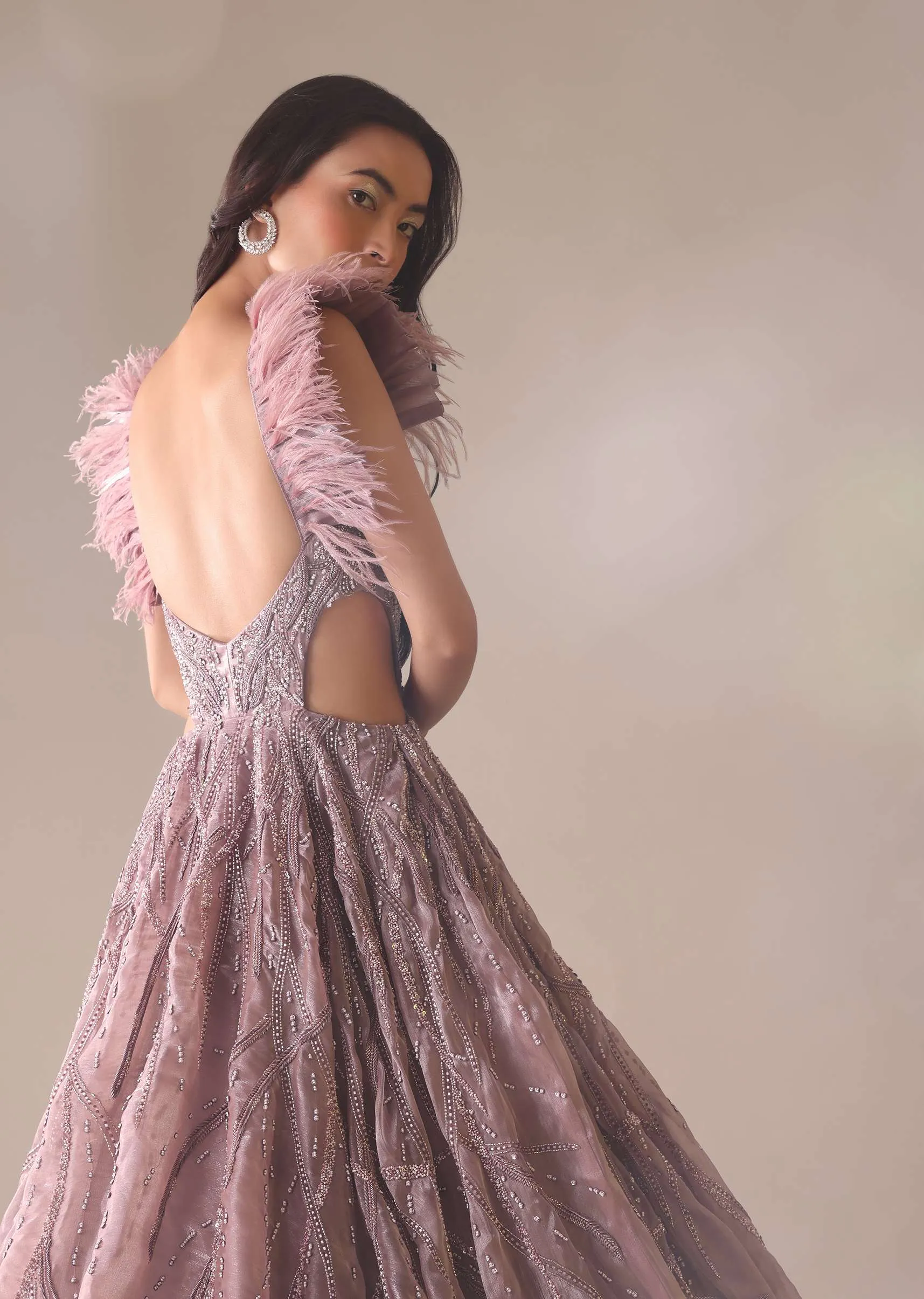 Onion Pink Bridal Gown With Feathered Sleeves And Heavy Embroidery